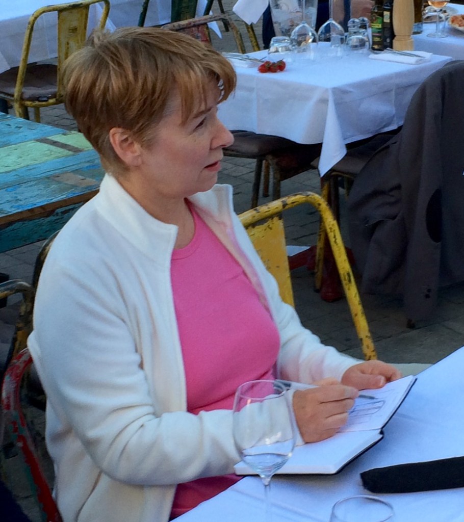 Colette sketching on Place Bellevue